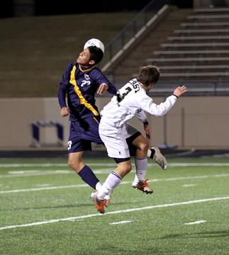 After the goalie kicked the ball, sophomore Arysha Khalilian battles for control by heading the ball. Arysha had success heading, scoring a goal against Plano West to put the team in second place. The step up from JV to varsity was a lot different because it was more challenging.
Photo by Colin Mitchell