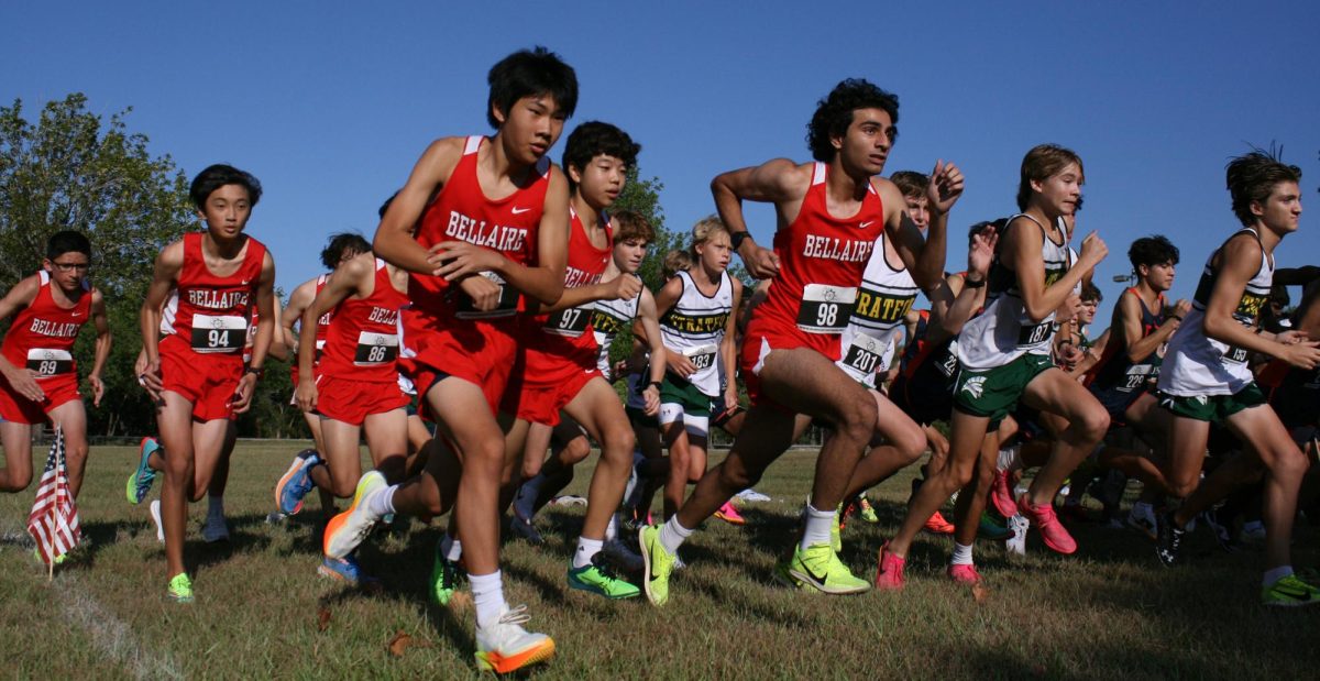 First-Year Photo, Superior: Runners from the varsity, JV and freshman teams take off at the starting line of the Strake Jesuit Cross Country Invitational. Jatin Presse11 was the team's fastest runner with a time of 17:16.10.