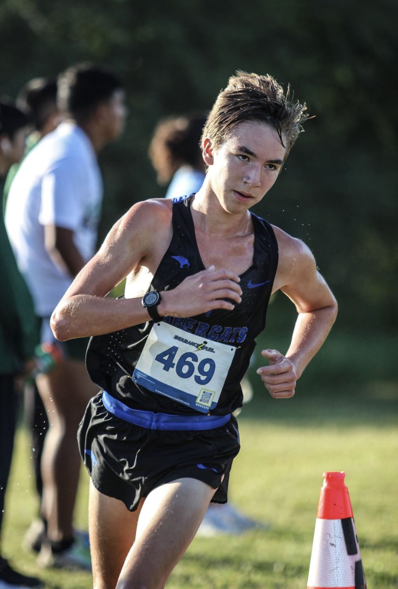 Sports Action Photo, Superior: Competing in the 5000 meter run with a PR of 17:01.0 is sophomore Marcelo Corbitt.